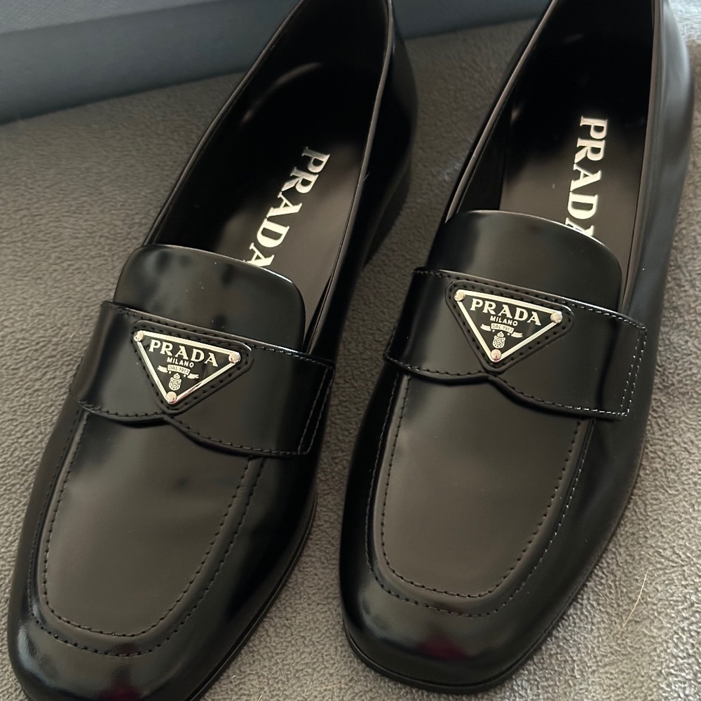 Prada logo-plaque leather loafers